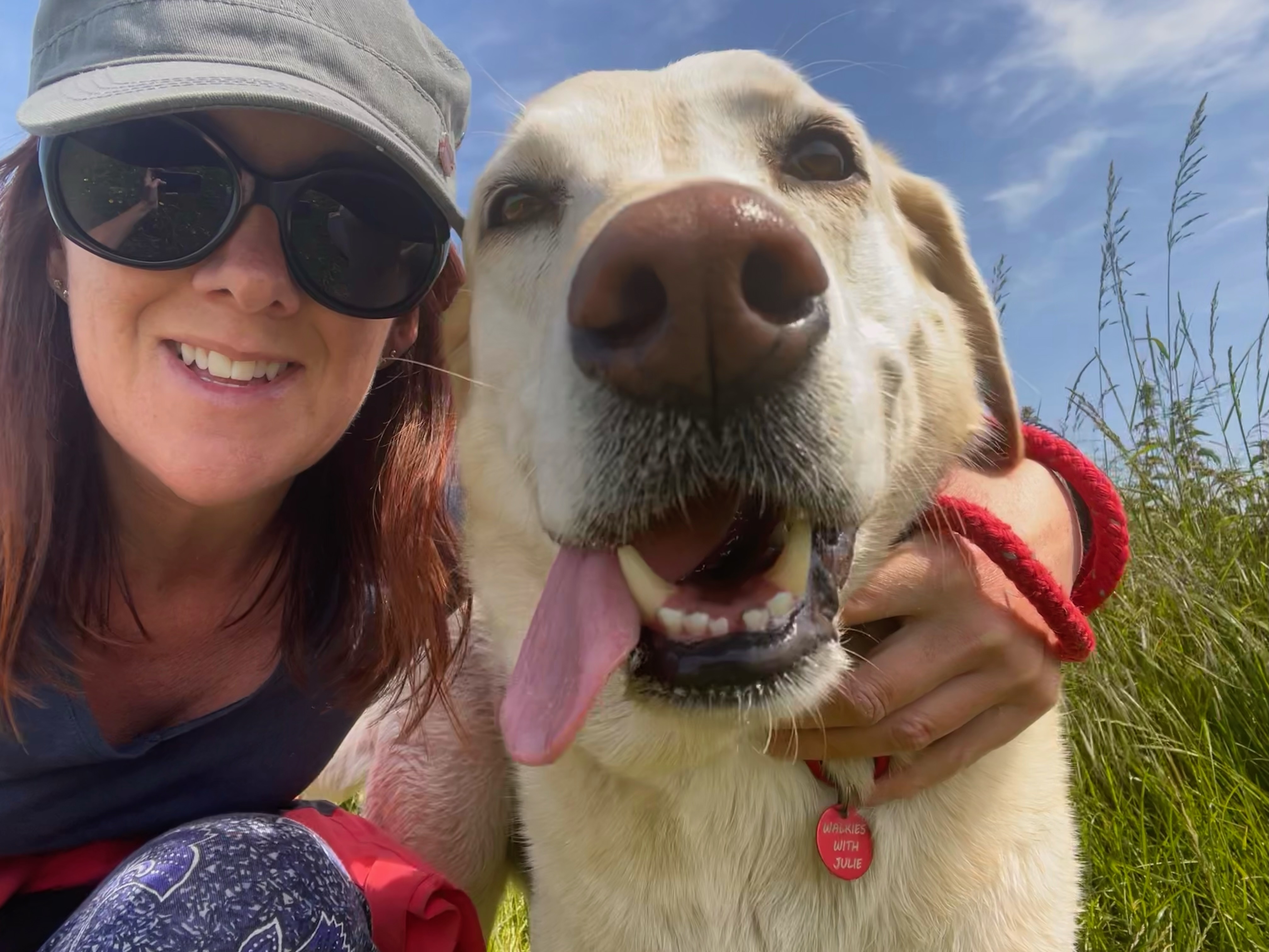 a photo of julie close to a dog